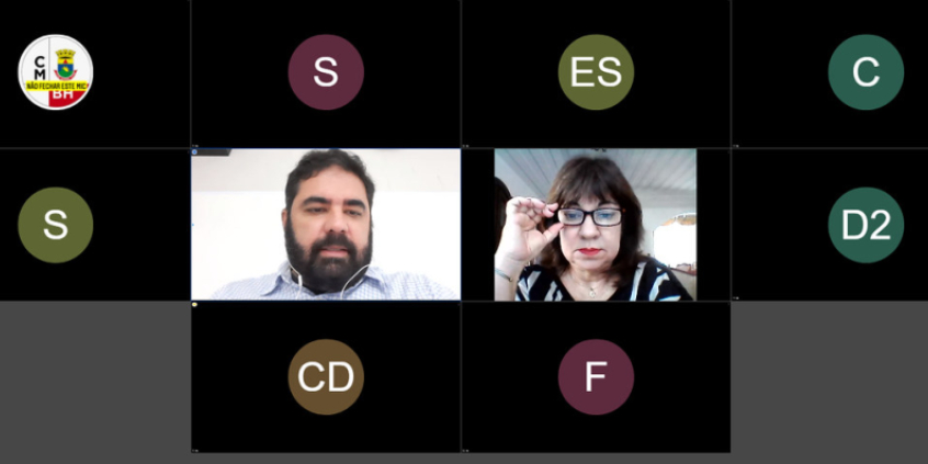Monitor exibe vereadores em videoconferência. Fotos dos vereadores Bruno Miranda e Marilda Portela em reunião virtual.
